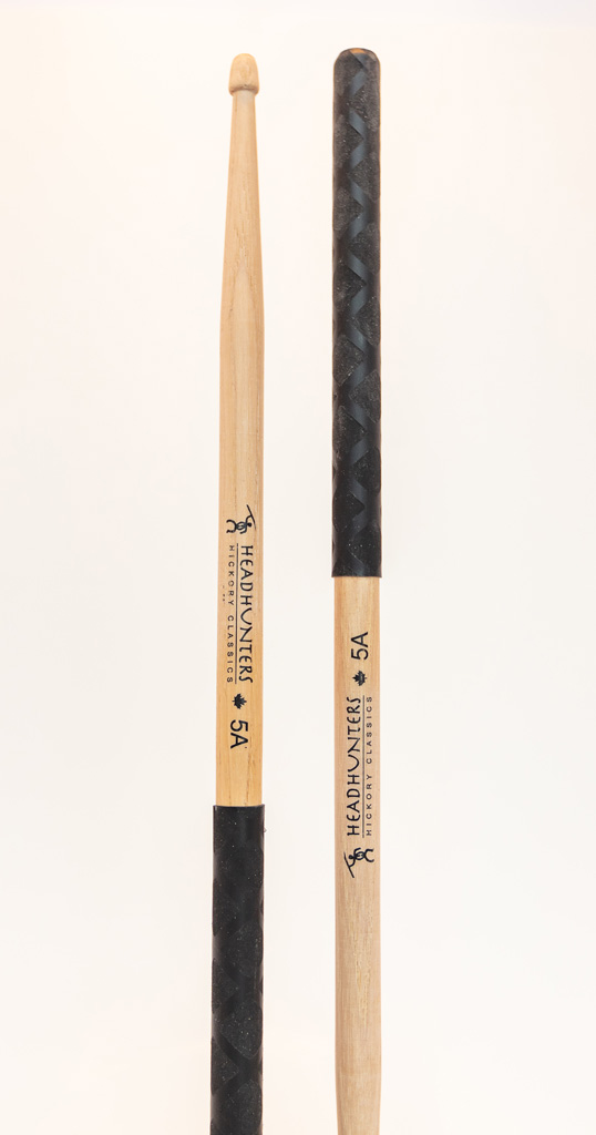 HeadHunters Hickory Classic 5A BX drumsticks — black double-texture X-pattern grip, acorn tip, Made in Canada