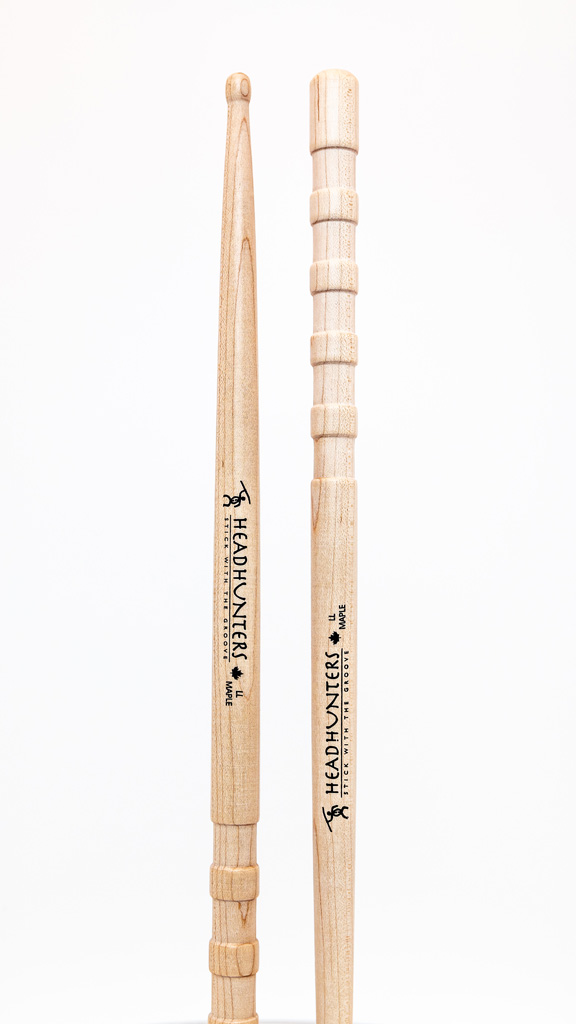 HeadHunters Maple Grooves LL drumsticks, 17.5mm Canadian maple with prominent lathed grooves, isolated on white background made in Canada