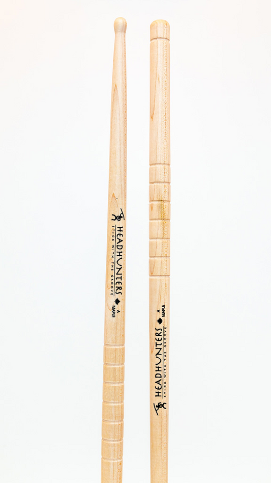 HeadHunters Maple Grooves A drumsticks, 14.50mm Canadian maple with precision-cut lathed grooves, isolated on white background