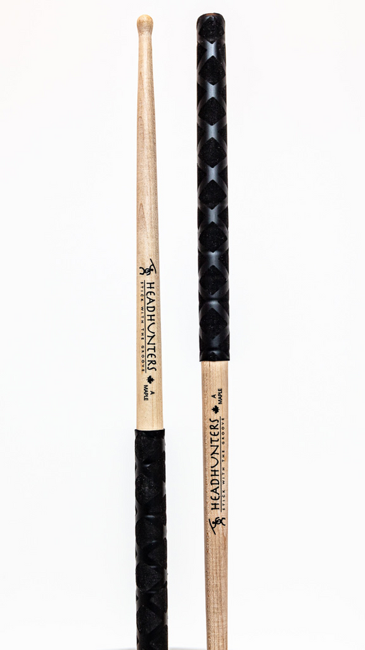 HeadHunters Maple Grooves A BX drumsticks, 15.25mm Canadian maple with lathed grooves and BX double X pattern grip, isolated on white background