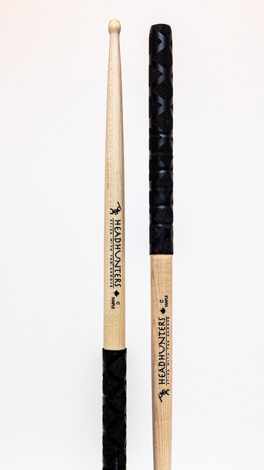 HeadHunters Maple Grooves C BX drumsticks, 16mm Canadian maple with lathed grooves and BX double X pattern grip, isolated on white background