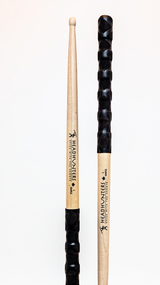 HeadHunters Maple Grooves L BX drumsticks, 16.5mm Canadian maple with lathed grooves and BX double X pattern grip, isolated on white background
