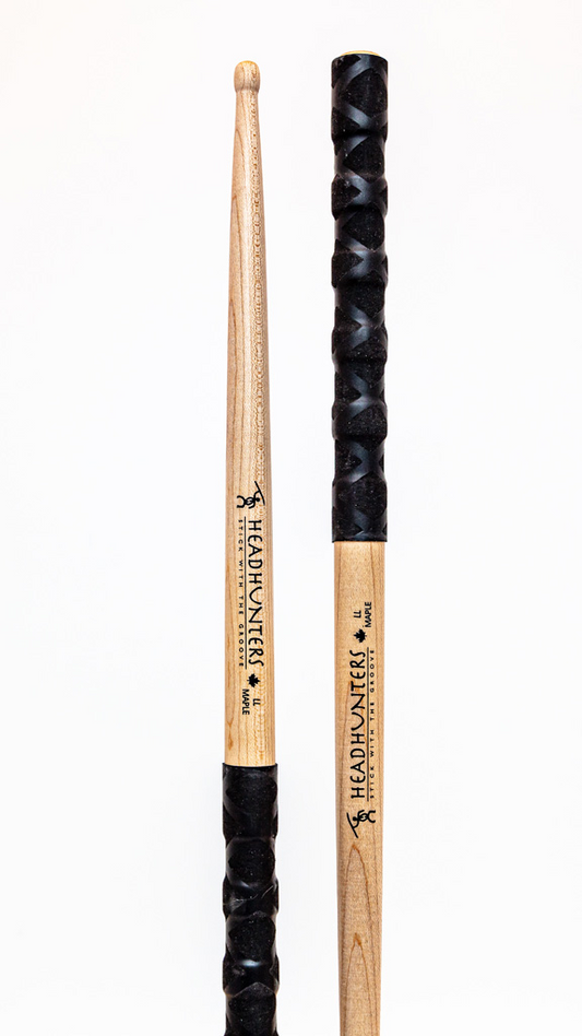HeadHunters Maple Grooves LL BX drumsticks, 17.5mm Canadian maple with prominent lathed grooves and BX double X pattern grip, isolated on white background