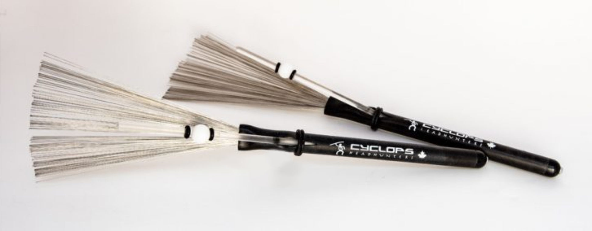 HeadHunters Cyclops hybrid drum brush — adjustable nylon sleeve on polycarbonate rod + non-retractable wire. Light, fast, and responsive. Made in Canada.